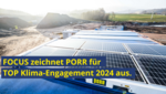 Bild zeigt Solarzellen auf einem Baucontainer; Im Hintergrund sieht man eine Baustelle: Bildtext : FOCUS zeichnet PORR für TOP Klima Engagement 2024 aus